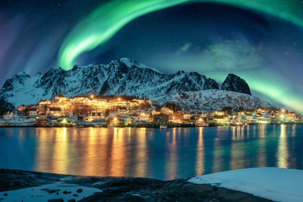 aurora-borealis-over-fishing-village-illumination